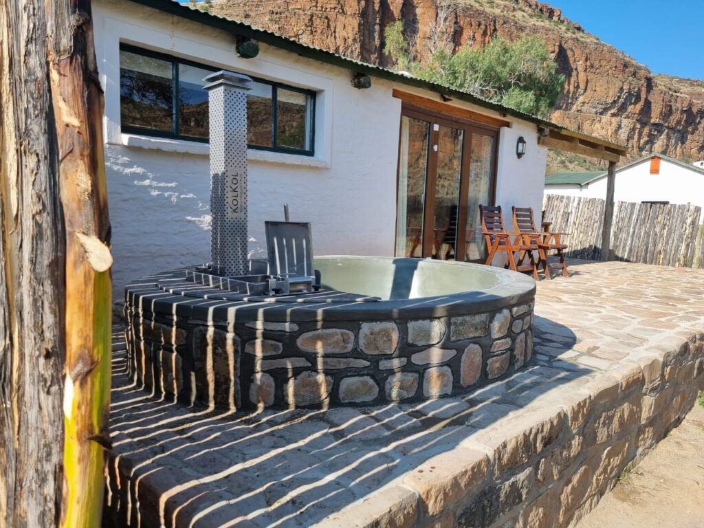 Wood-burning Kolkol hot tub on stoep